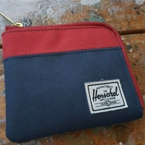 SLIGHTLY USED HERSHEL JOHNNY RFID WALLET NAVY BLUE AND RED TRIM